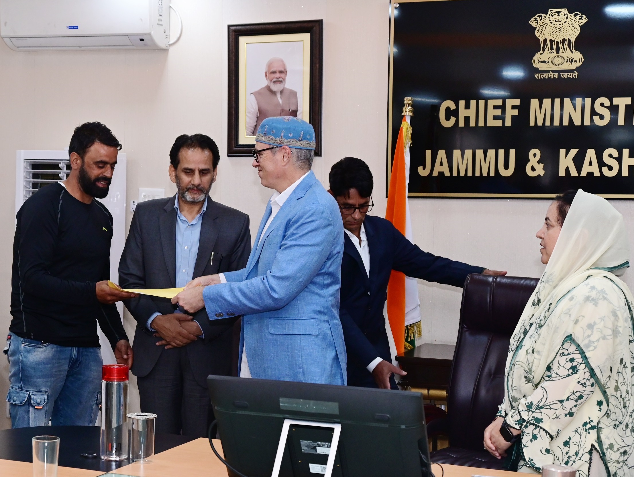 CM Omar Abdullah hands over regularisation orders to CPWs of School Education Department-25